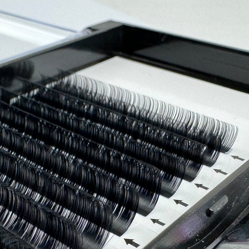 Secure a bulk supply of 0.10 DD Curl individual eyelashes for lash professionals and technicians. Wholesale orders available for eyelash extensions to elevate your beauty business. Asegure un suministro a granel de pestañas individuales 0.10 DD Curl para profesionales y técnicos de pestañas. Pedidos al por mayor disponibles de extensiones de pestañas para elevar su negocio de belleza.